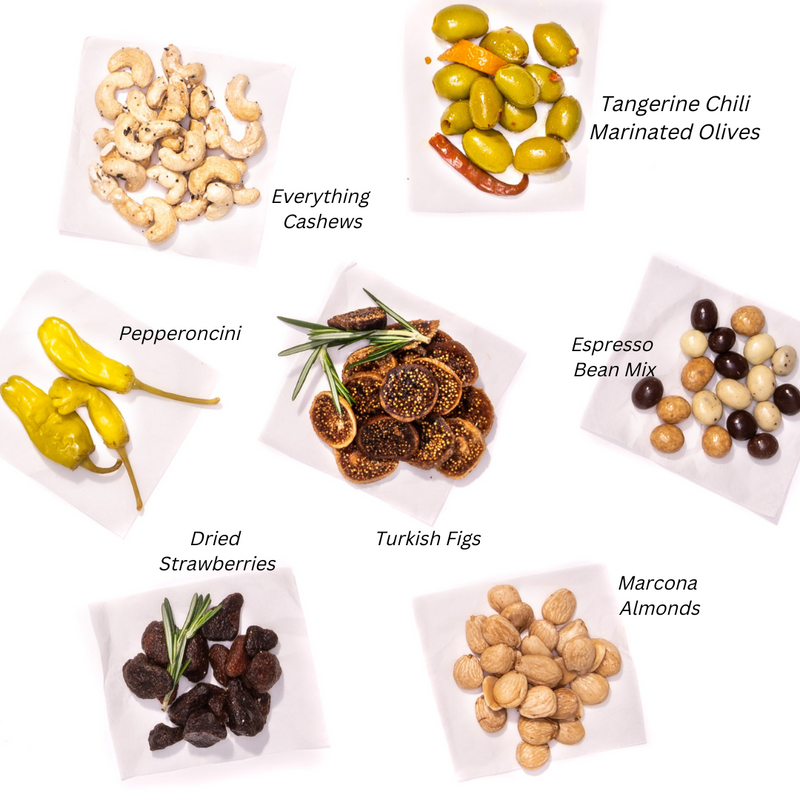 Charcuterie sides include everything cashews, marinated olives, pepperoncini, Turkish figs, espresso bean mix, dried strawberries, & Marcona almonds