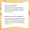 FAQ section displaying information about board shipping and ingredient sourcing from artisan producers worldwide on a cheese background.