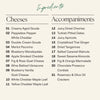 Medium Thanksgiving cheese board ingredients list showing eleven gourmet cheeses and ten seasonal accompaniments including maple leaf cheddar cutouts and chocolate prosecco cordials.