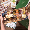 Father's Day charcuterie gift box with cheese cut into “DAD” and “#1,” surrounded by assorted meats, nuts, dried fruits, and crackers, beautifully packaged for gifting.