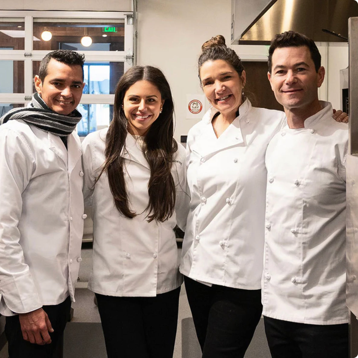 four boarderie chefs in production kitchen