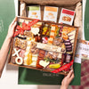 charcuterie board gift delivery Valentine's Day theme wrapped in the shipping box with 3 boxes of crackers