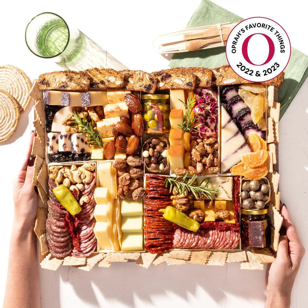 Charcuterie board with assorted cheeses, meats, nuts, and dried fruits, featured on Oprah's Favorite Things 2022 & 2023.