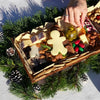 Christmas charcuterie board gift being enjoyed as a festive appetizer for a holiday celebration