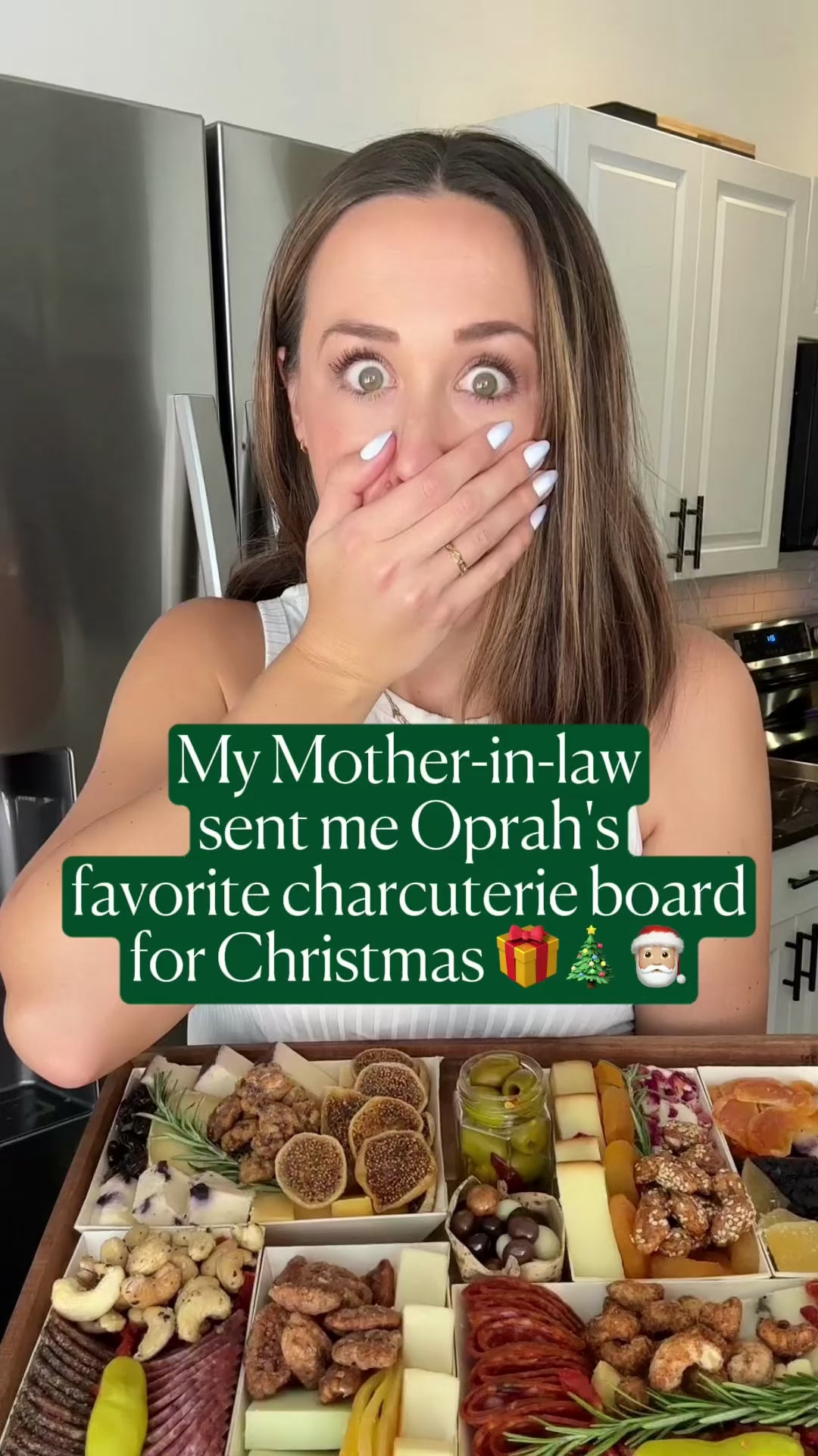 Woman unboxing Oprah's favorite charcuterie board from Boarderie with festive backdrops including a red table and a white table with people sitting. 