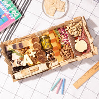 medium teacher-appreciation charcuterie board with cheeses, meats, nuts, apple-shaped cheese, & an 